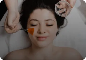 Professional peel being applied with a brush at Maya Skin & Brow Studio, Midtown Manhattan