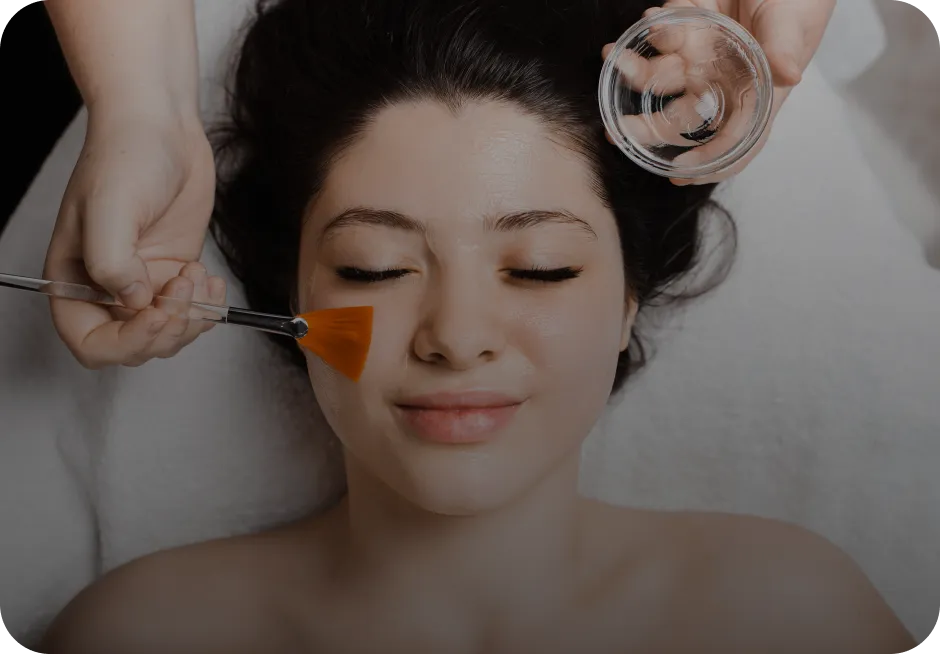 Professional peel being applied with a brush at Maya Skin & Brow Studio, Midtown Manhattan